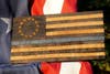 An oak interpretation of the American Flag​ has been carved from the 619-year-old Basking Ridge Oak Tree​.